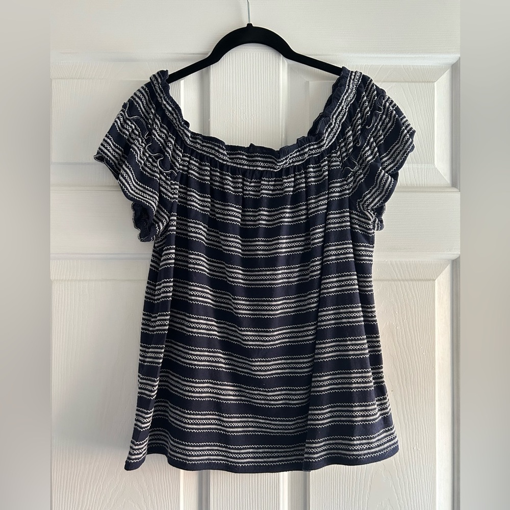 Navy short sleeve ruffled knit top with embroidery detail